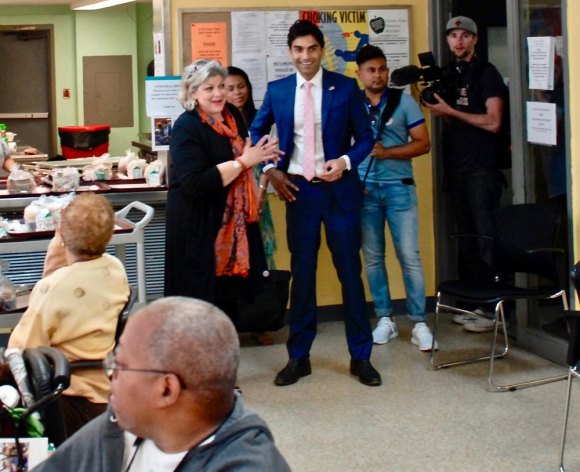 Friday, June 8th, Suraj Patel Builds Friendships on Roosevelt Island Director Lisa Fernandez introduces candidate Patel to seniors in the lunchroom.